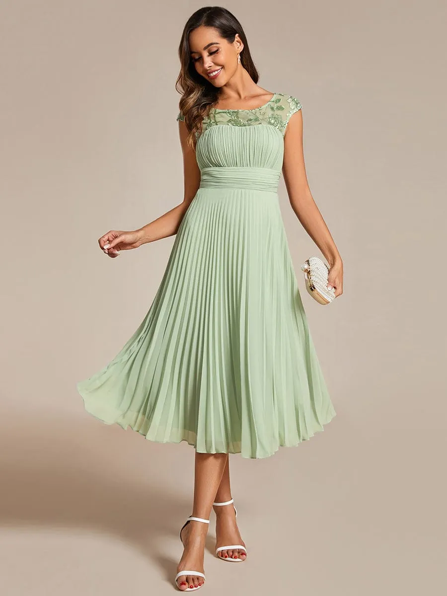 A-Line Pleated Chiffon Wedding Guest Dress with Round Neckline and Cap Sleeves