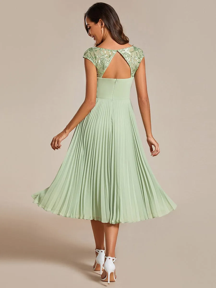 A-Line Pleated Chiffon Wedding Guest Dress with Round Neckline and Cap Sleeves