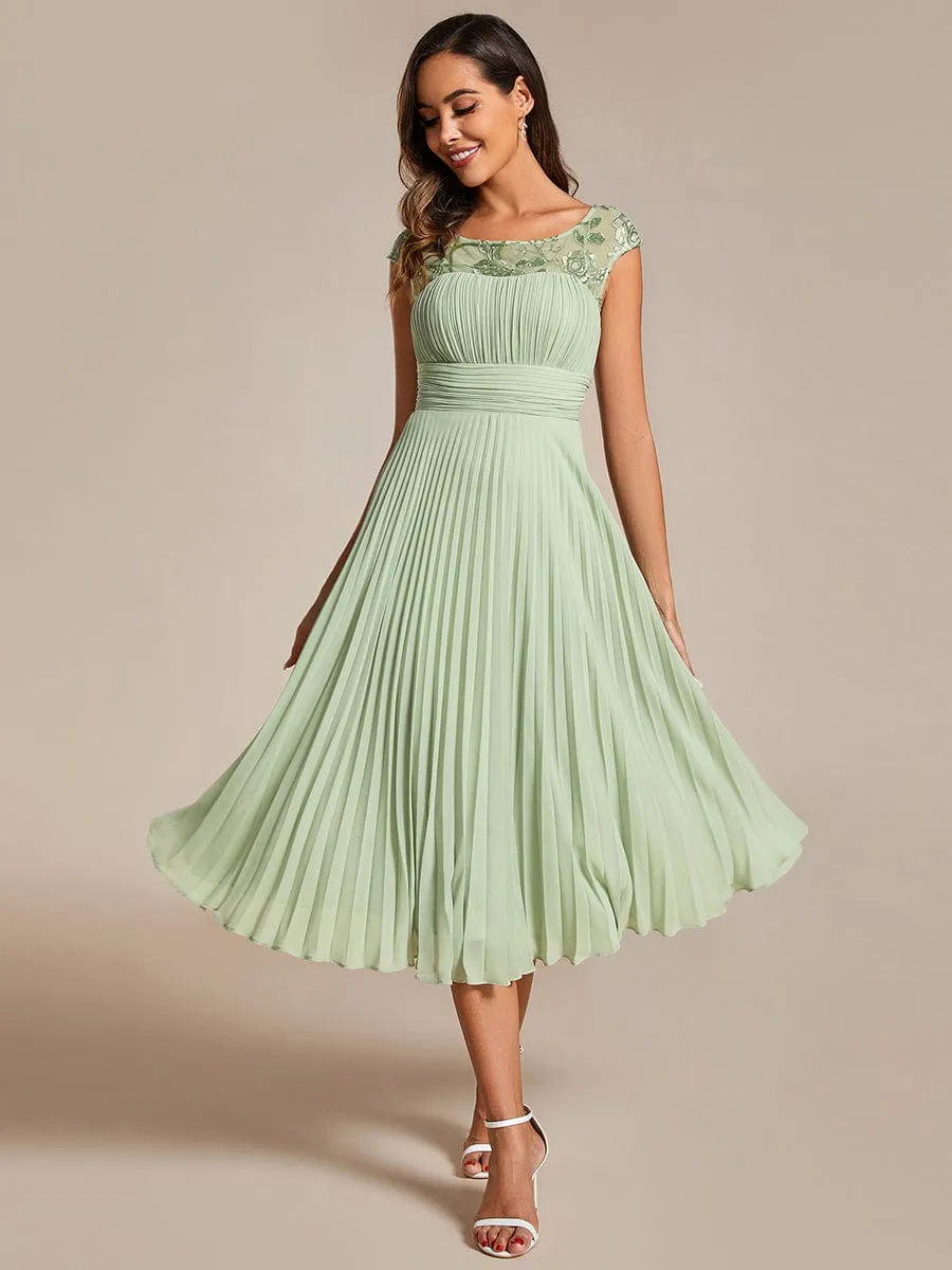 A-Line Pleated Chiffon Wedding Guest Dress with Round Neckline and Cap Sleeves